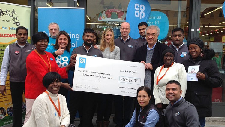 Cheque Presentation at Denmark Hill Co-op Pic: Southwark News